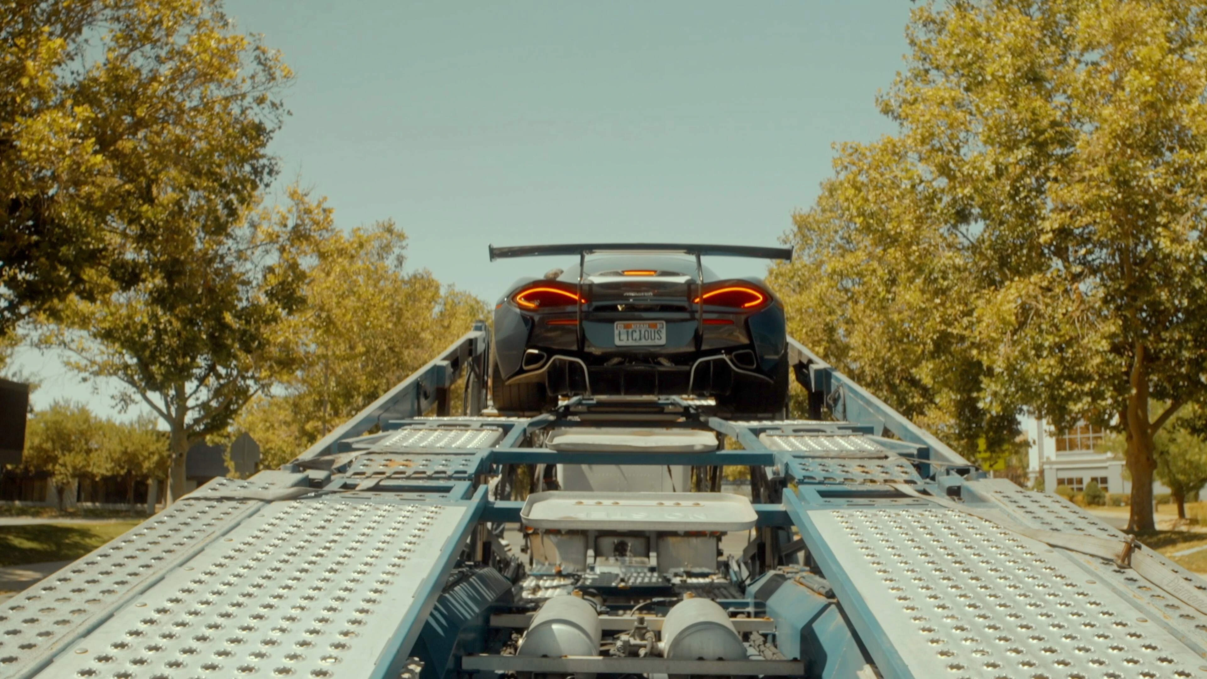 Open carrier with sedans